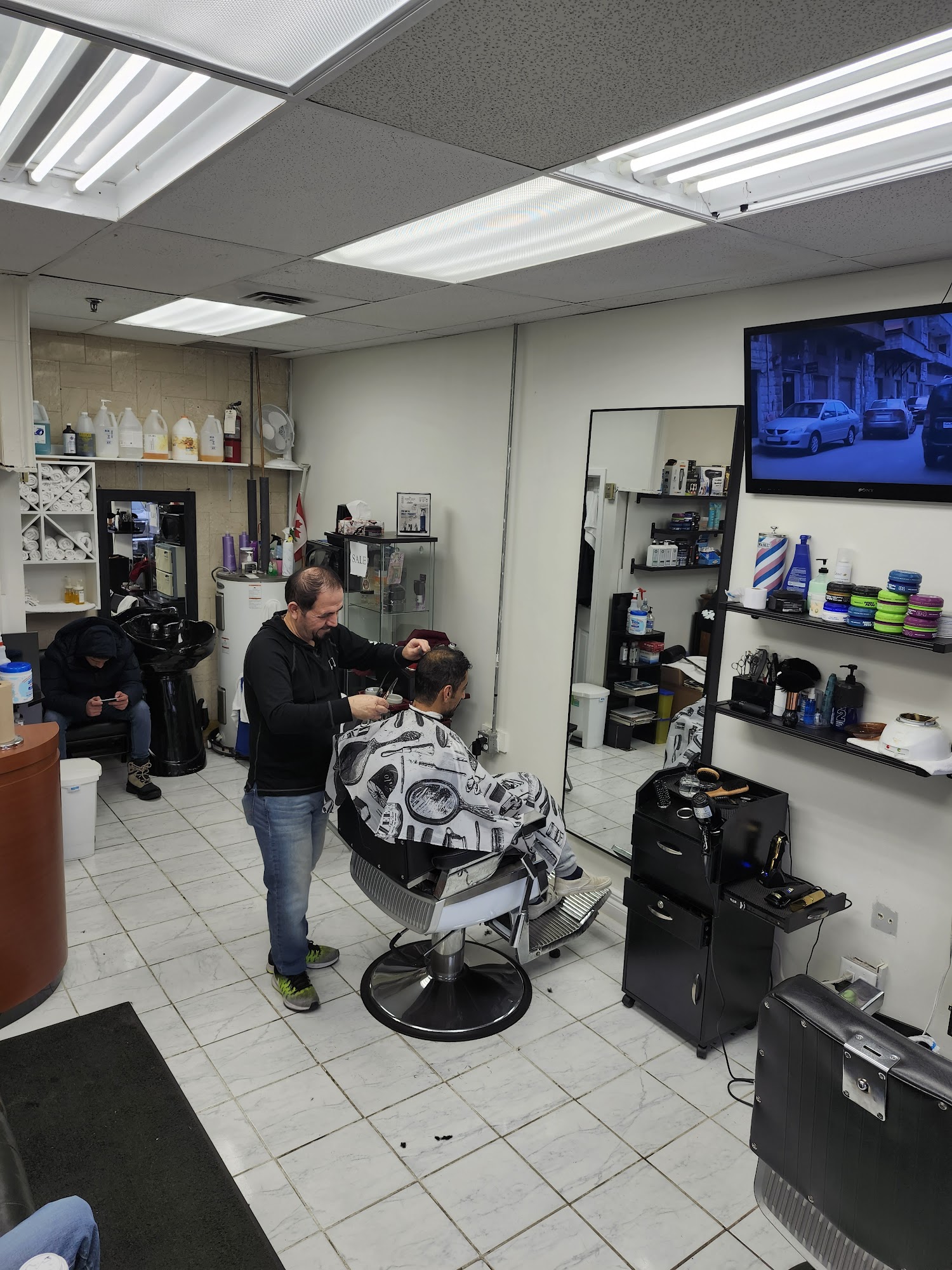Inside Kamal Barber Shop in North York